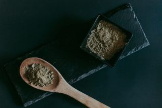 Brown Wooden Spoon on Black Wooden Table