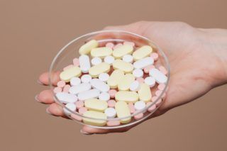 Variety Of Medicines On Glass Container